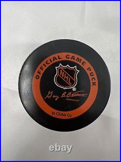 Hockey Puck collection set of 5 pucks autographed hockey puck Mike Eruzioe plus