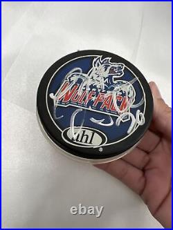 Hockey Puck collection set of 5 pucks autographed hockey puck Mike Eruzioe plus